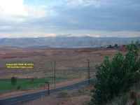 irrigated golf course controversial Glen Canyon Dam Page Arizona showing barren agricultural land farmed by native Americans