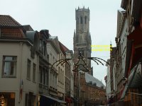 Belfry of the Bruges museum (Bruggemuseum Belfort) seen from the Wollestraat Bruges Belgium copyright free photo royalty free photo January 2007