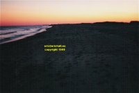 southernmost point of Long Beach island New Jersey looking south to Atlantic City dusk copyright free photo royalty free photo