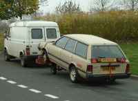 the Subaru hitches a ride on the dolly